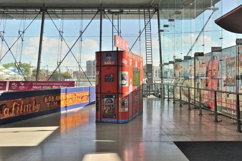 Bob and Roberta Smith and Tim Newton, The Stratford Cinema Kiosk in situ at Stratford station, part of the Who is Community? project, 2012. Photograph: Thierry Bal