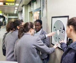 Students examining a Labyrinth