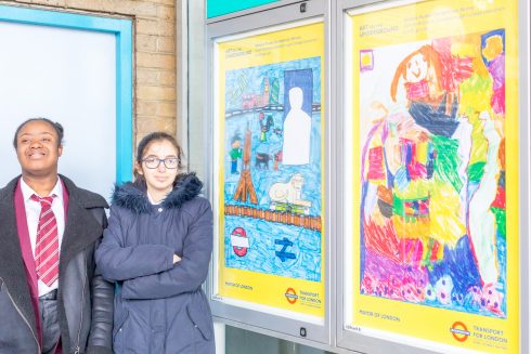 Zafirah and Sarah with their winning poster designs, 2018. Photo: Benedict Johnson, 2018