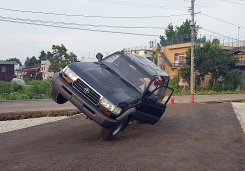 Ahmet Öğüt, The Drifters, 2018 
Installation in public space; A balanced 80s Toyota Land Cruiser on two wheels. 
Commissioned by Echigo-Tsumari Art Triennale.
